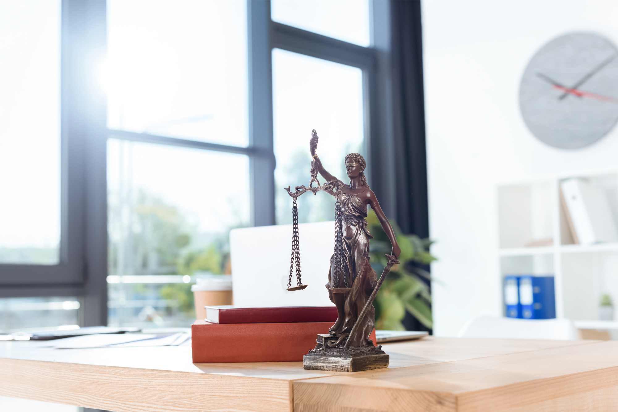 Lawyer workplace with themis sculpture Lawyer workplace with themis sculpture
